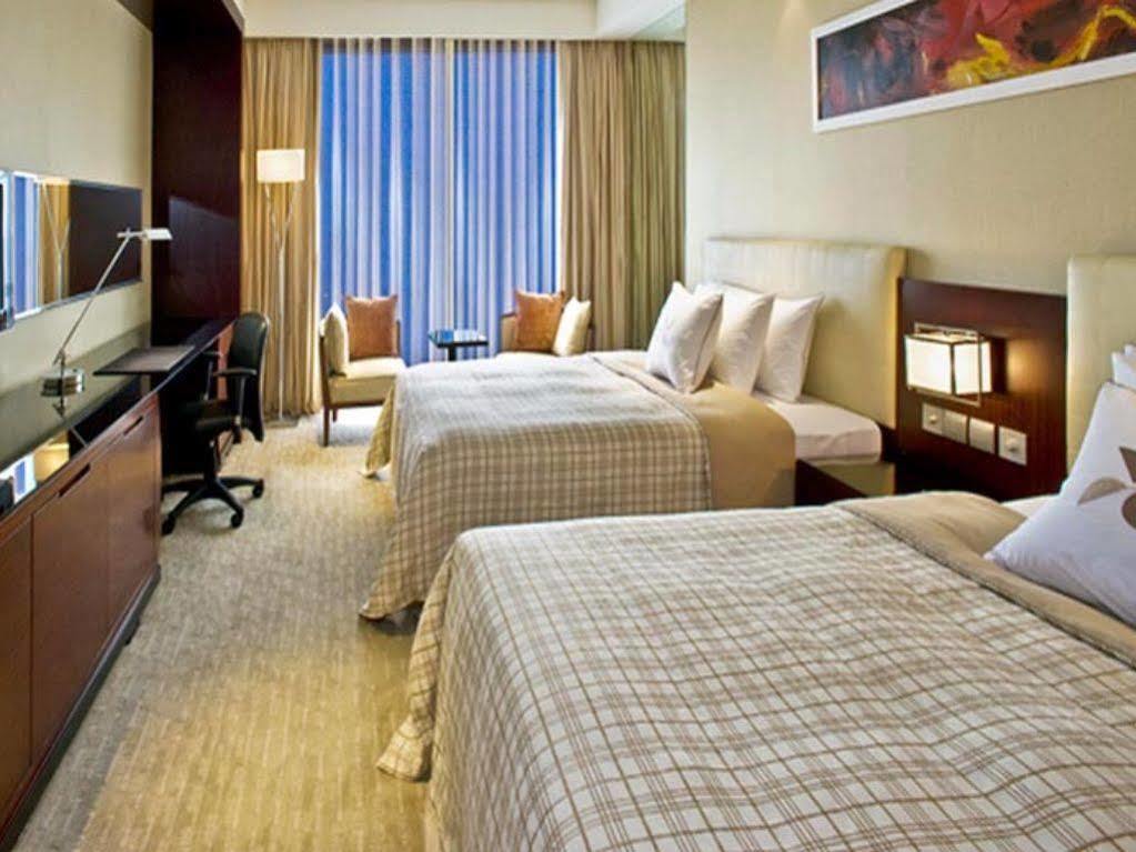Sheraton Grand Hangzhou Binjiang Hotel Экстерьер фото
